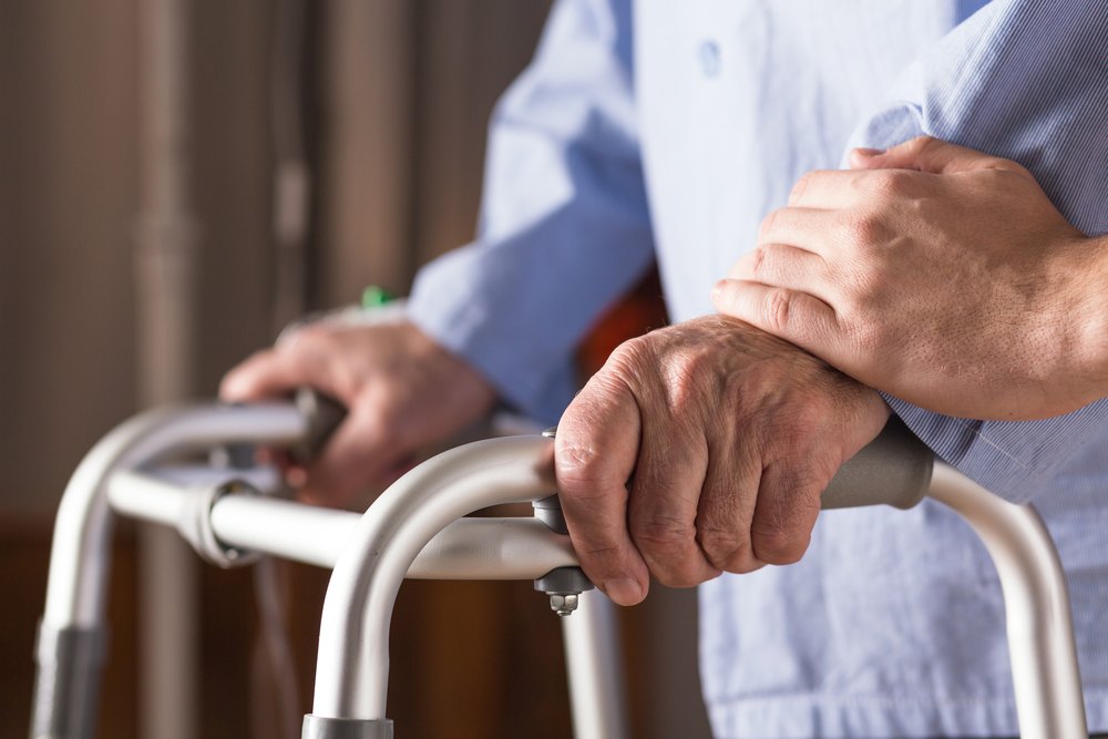 Elderly-person-holding-walking-frame