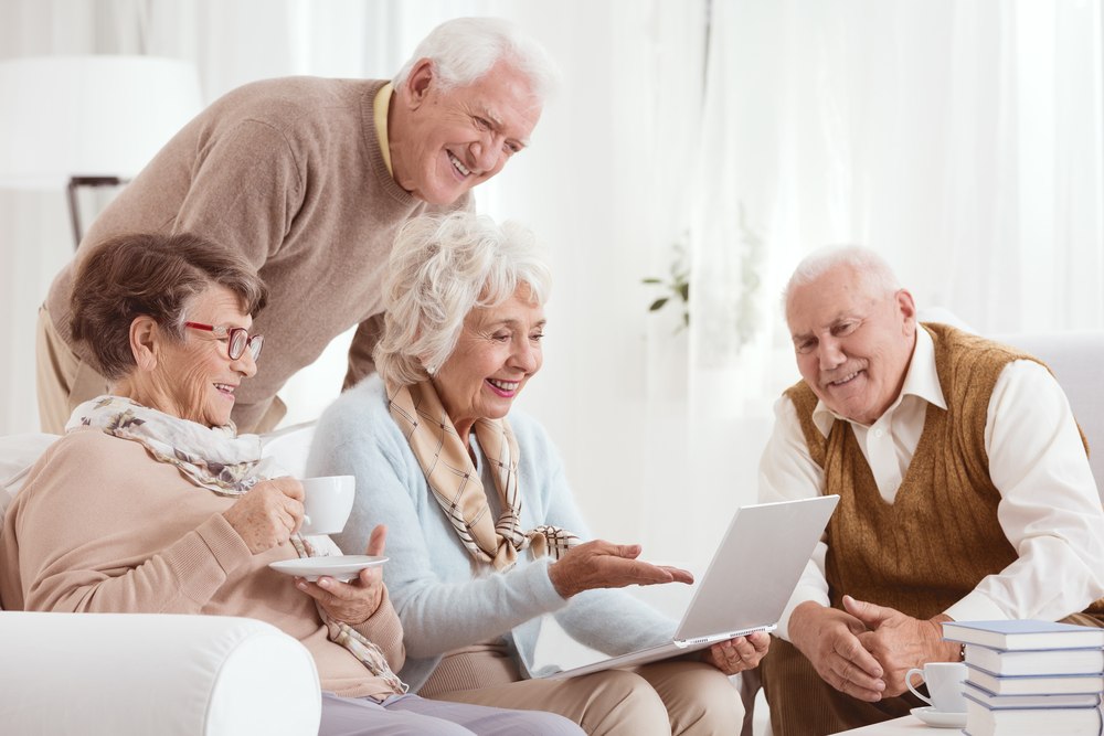 Older-people-looking-at-laptop
