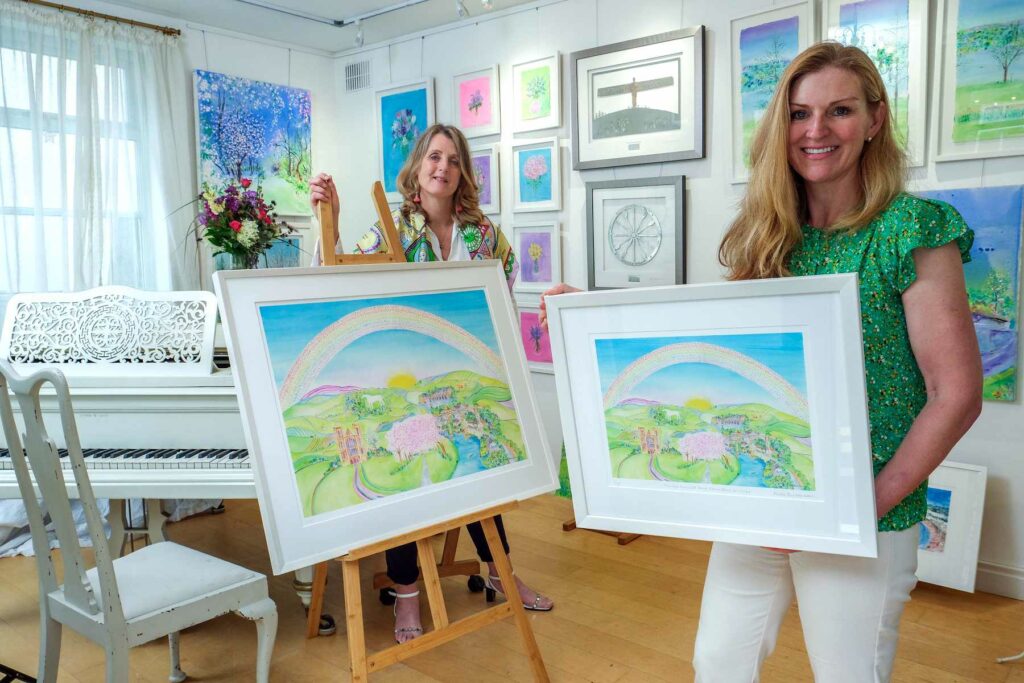 rtist Anita Bowerman, left, and Continued Care’s director Samantha Harrison at The Dove Tree Art Gallery and Studio in Harrogate with the ‘Rainbow of Hope’ painting