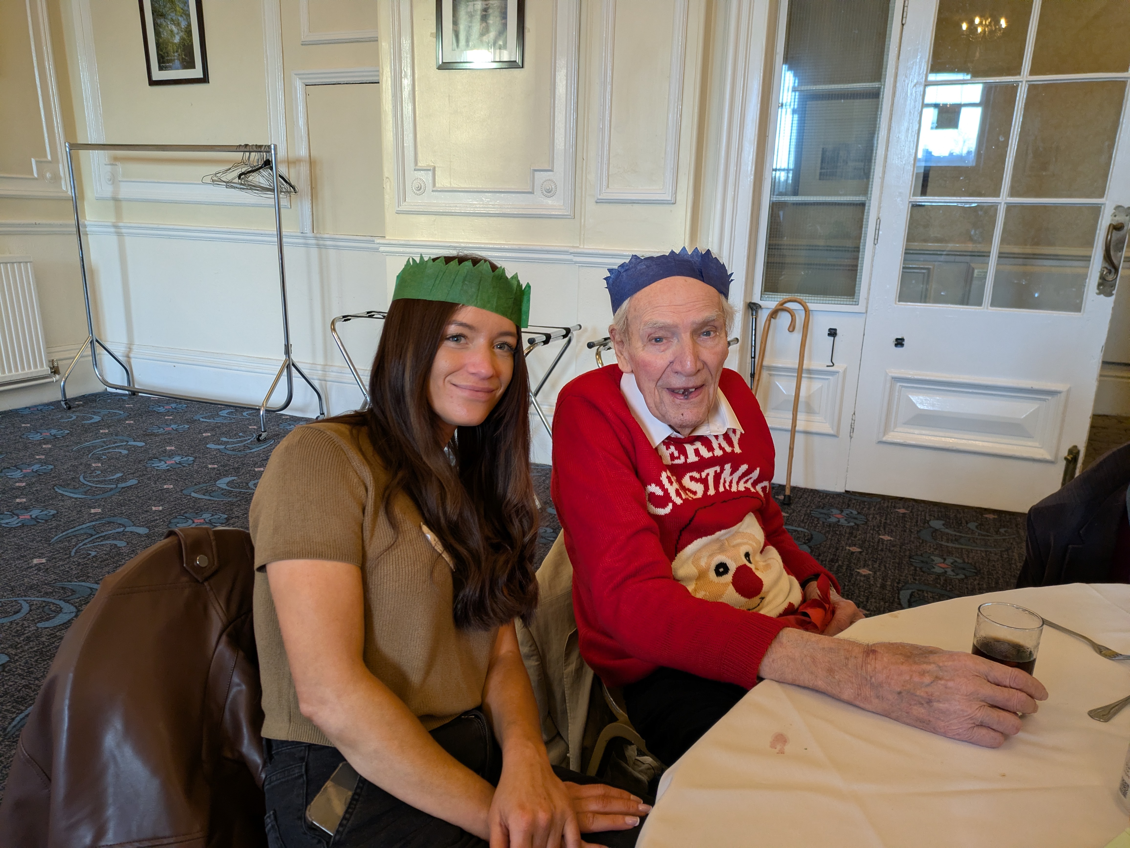 A service user with his granddaughter at the Continued Care Christmas Luncheon 2025 in Harrogate