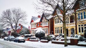 snowy street scene to illustrate story about staying safe and well in winter